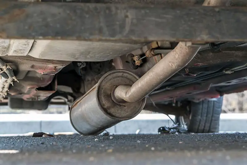 Old, damaged muffler that needs to be replaced