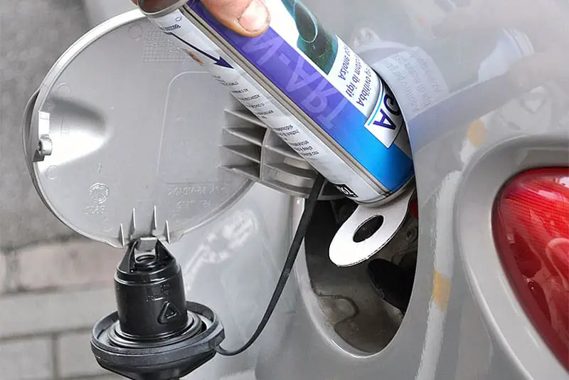 adding catalytic converter cleaner as a gas additive